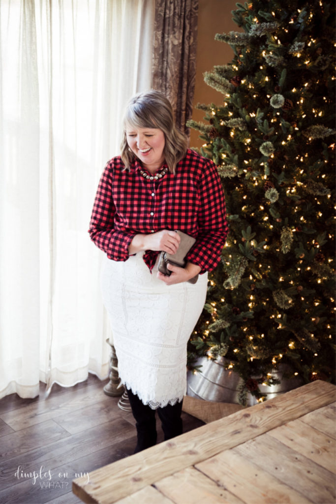 Buffalo plaid flannel shirt, white lace pencil skirt and black knee boots || Holiday party outfit with buffalo plaid shirt || How to style a buffalo plaid flannel shirt for a party || #plussizefashion #fashionforcurvywomenover40