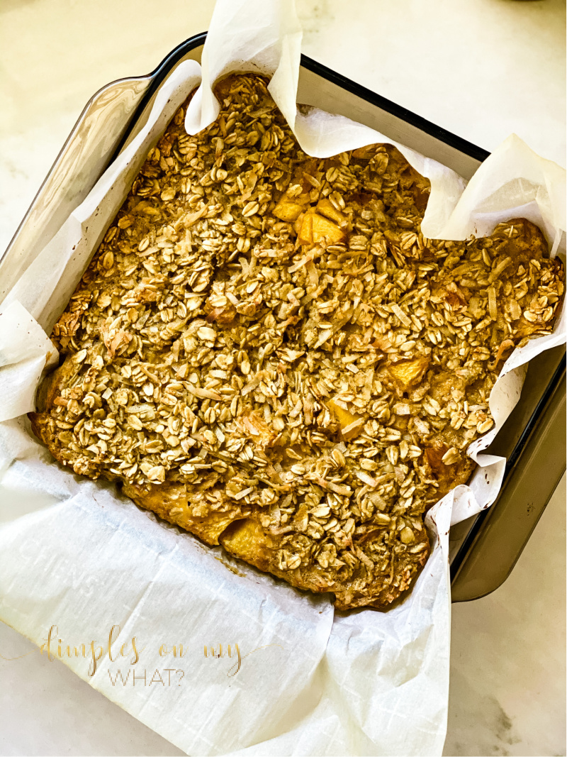 Coconut Peach Baked Oatmeal - A delicious and healthy twist on baked oatmeal. It's low in refined sugar, dairy and gluten free and DELISH! 

#bakedoatmeal #healthybreakfasts #breakfaststogo