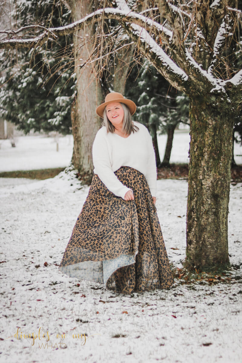A leopard print maxi skirt and cozy sweater create an enchanting  holiday outfit.   #plussize #midsize #over50fashion
