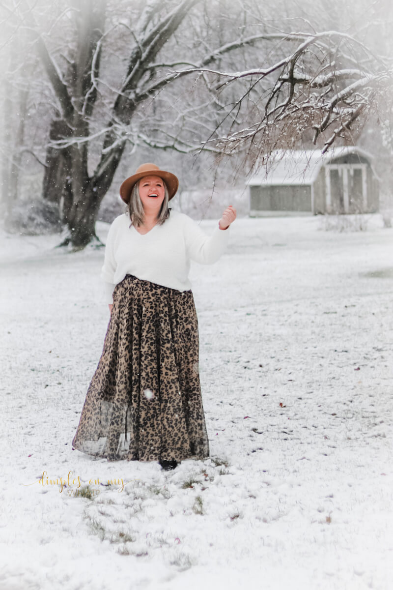 A leopard print maxi skirt and cozy sweater create an enchanting  holiday outfit.   #plussize #midsize #over50fashion