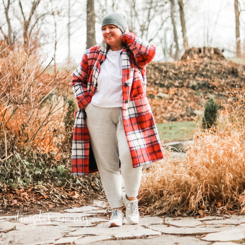 a plaid coat and joggers make for a cozy outfit to-go.