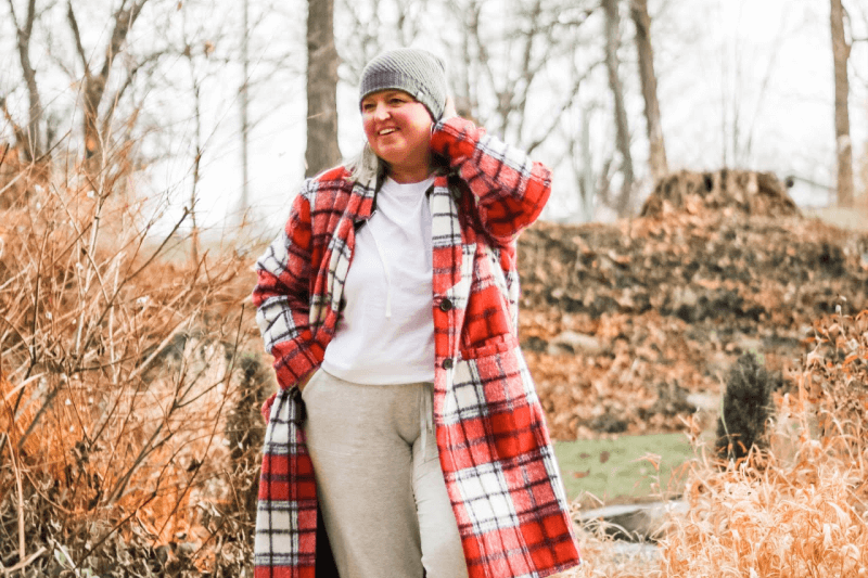 Plaid coats and joggers create a cozy and fun outfit.