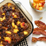 This Peach Baked Oatmeal combines tart peaches with sugar sweetened bacon for a unique twist on a brunch favorite.