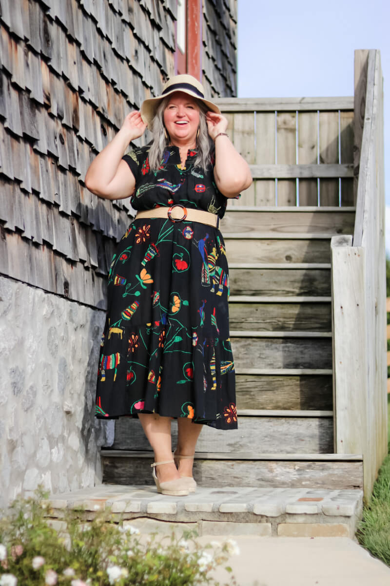 Don't put your summer dresses away when the weather starts to cool down. Booties and jean jackets can transform them into the perfect fall outfit. #midsize #midsizefalloutfit #falloutfitinspiration #transitionalfashion #plussize #fashionforwomenover50 #longgrayhairstyles