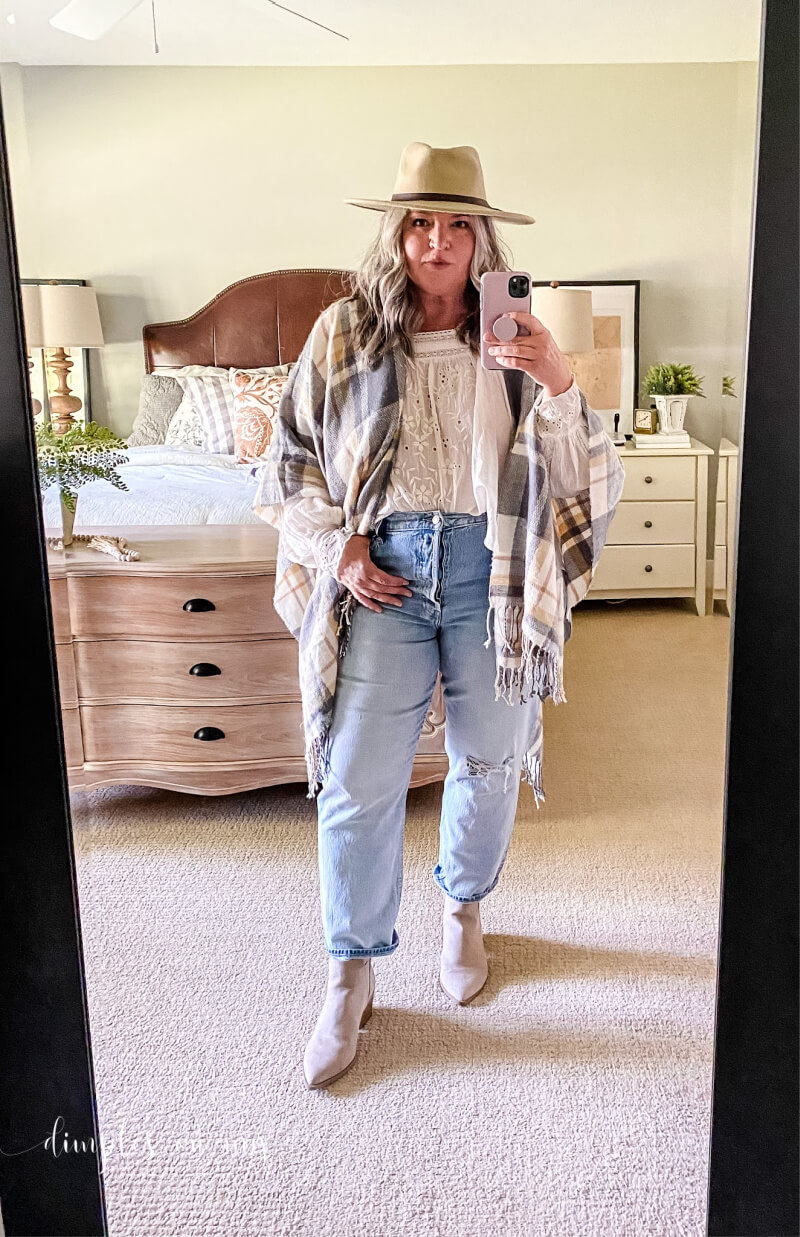 Midsize outfit inspiration for fall includes straight leg jeans and a poncho. #midsizeouts #midsizeoutfitsforfall #midsizeoutfitsfall #midsizeoutfitsfall2021 #midsizecamopant #over50fashion #over50style