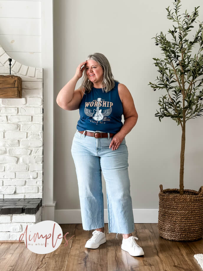Styling plus-size cropped wide-leg jeans six ways. Keeping the cropped wide leg jeans casual with a graphic tank and platform sneakers. #plussize #plussizefashion #plussizeover50fashion #plussizeoutfitinspiration #plussizejeans #plussizecasualfashion
