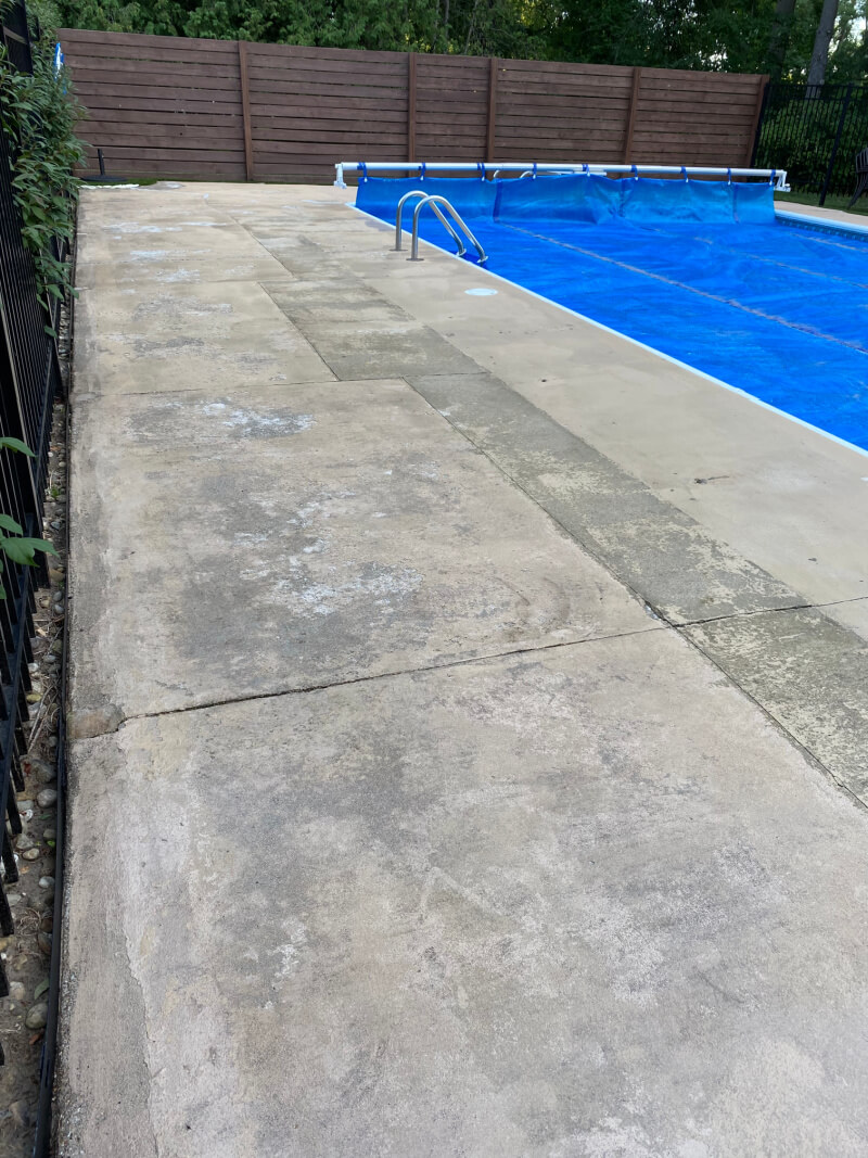 Resurfacing concrete is expensive no matter what material you use. But we did it ourselves and save a lot of money. Here's how we resurfaced our concrete for less. #poolconcrete #coolpooldeckcoating #concreteresurfacing #paintingconcrete #pooldecor