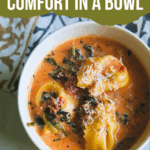 Creamy Italian sausage tortellini soup with spinach served in a bowl